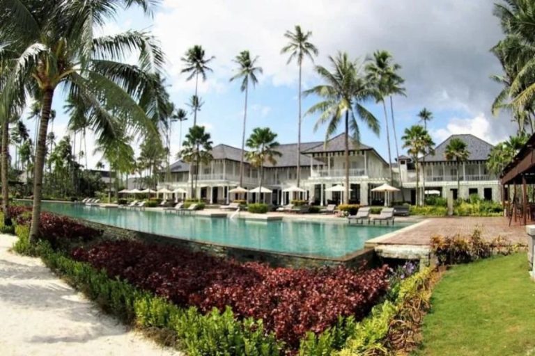 Beach view of The Sanchaya with pool and resort grounds