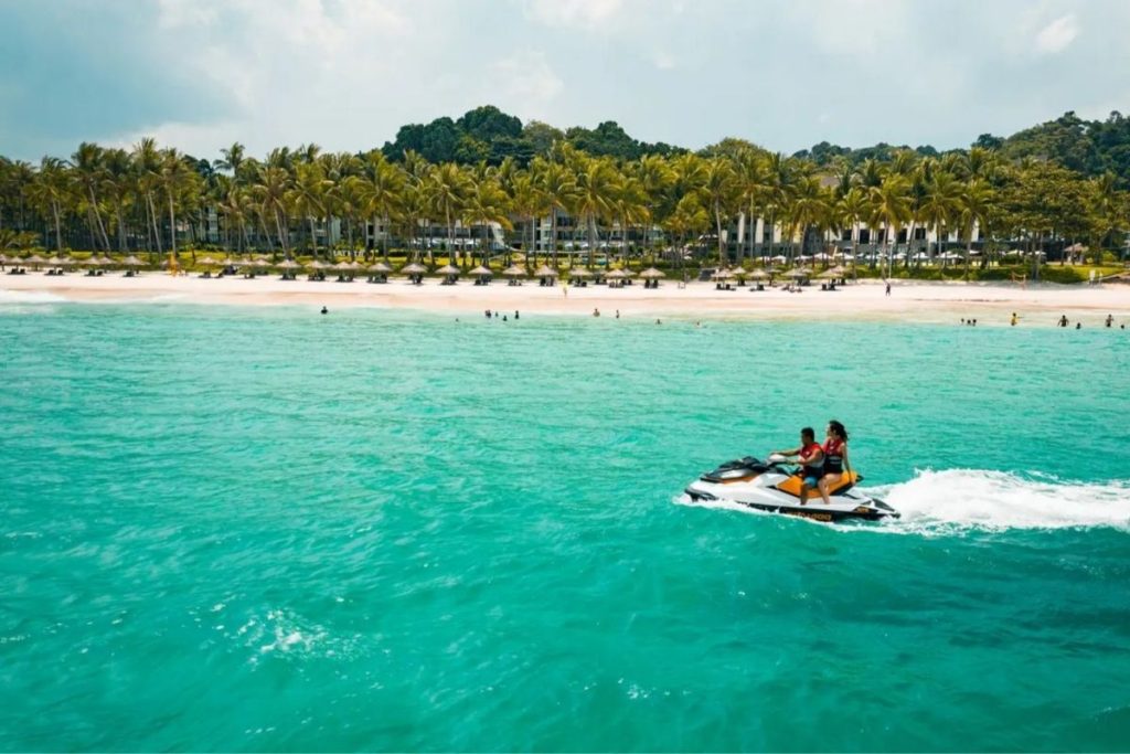 Jetski activity at Club Med Bintan beach with resort view
