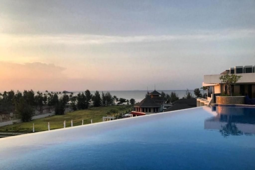 Rooftop pool at Grand Lagoi Hotel Bintan with sea-facing view