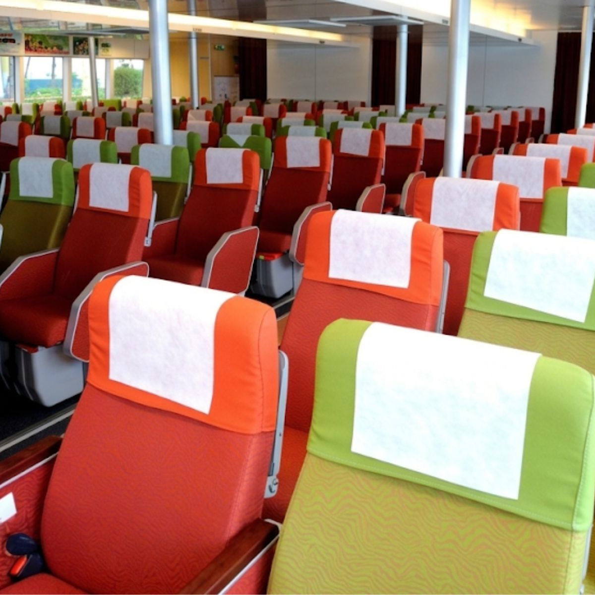 Interior seating inside Bintan ferry with air-conditioned passenger cabin