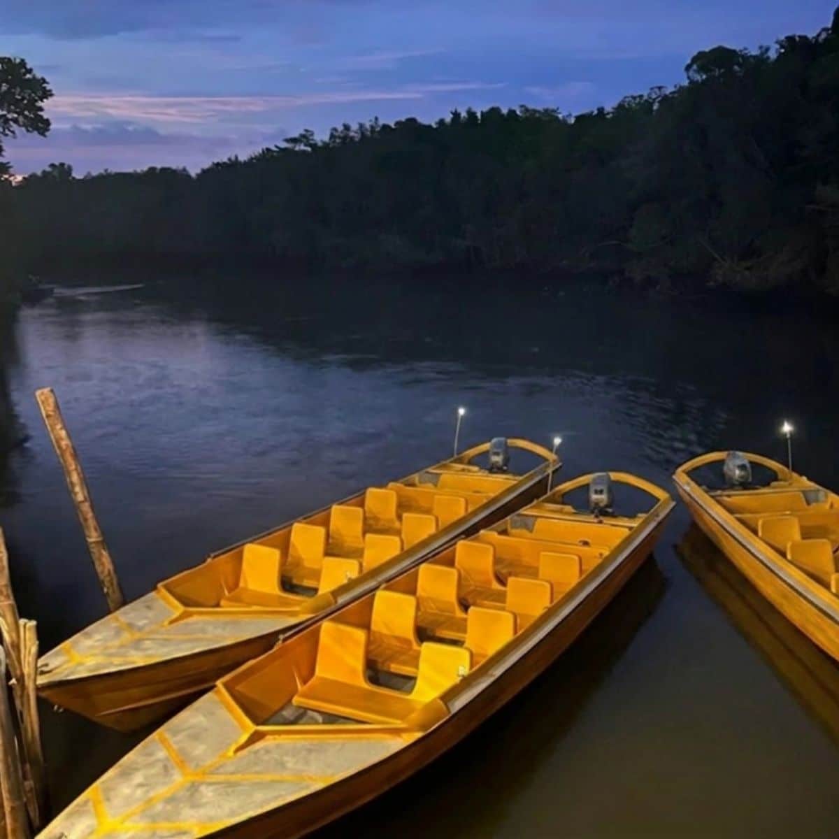 Fireflies tour boat parked at Sebung River jetty Bintan night cruise departure
